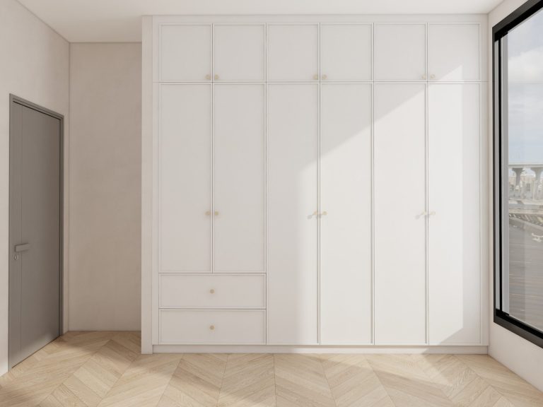 A sleek white wardrobe with minimalist design, featuring clean lines and gold hardware. Perfect for contemporary bedrooms with a sophisticated touch.