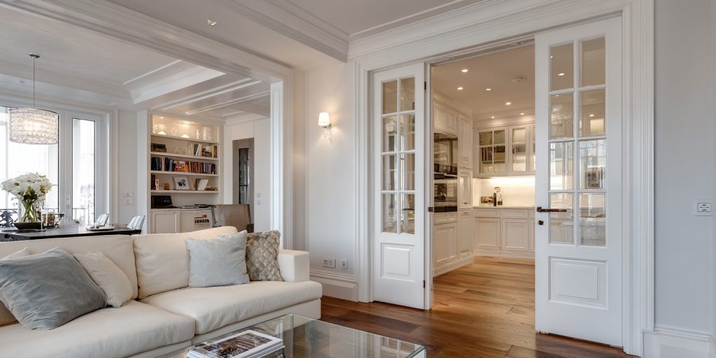 Top 10 Modern Interior Wood Doors Ideas to Elevate Your Home 37 Classic wood french doors interior style connecting living and kitchen
