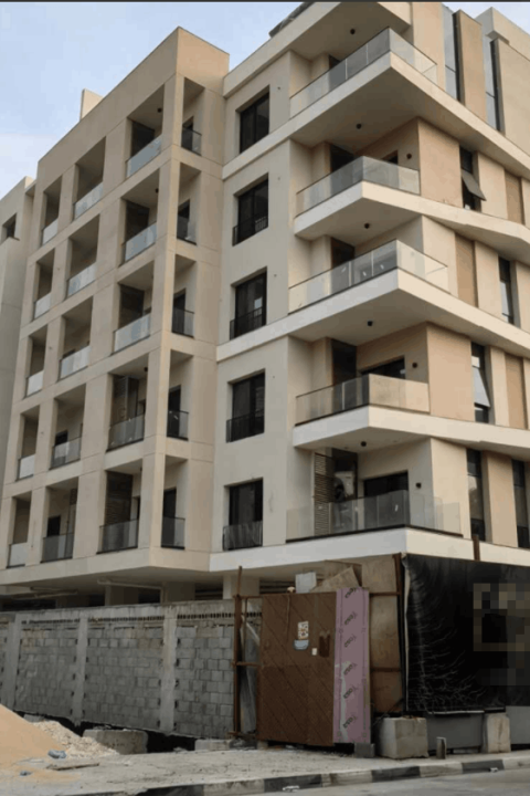 169 Sets Modern Minimalist Apartment Custom Cabinets Project in Dammam 1 Exterior view of a Dammam apartment building for a 169-set custom cabinets project.