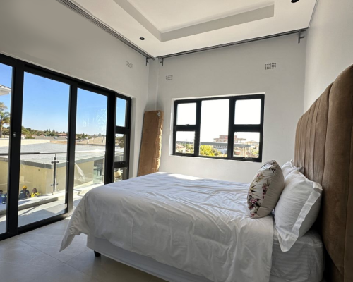 12 Sets Zimbabwe Whole House Custom 3 Custom bedroom with large windows, a comfortable bed, and modern finishes in a Zimbabwe full house custom project.